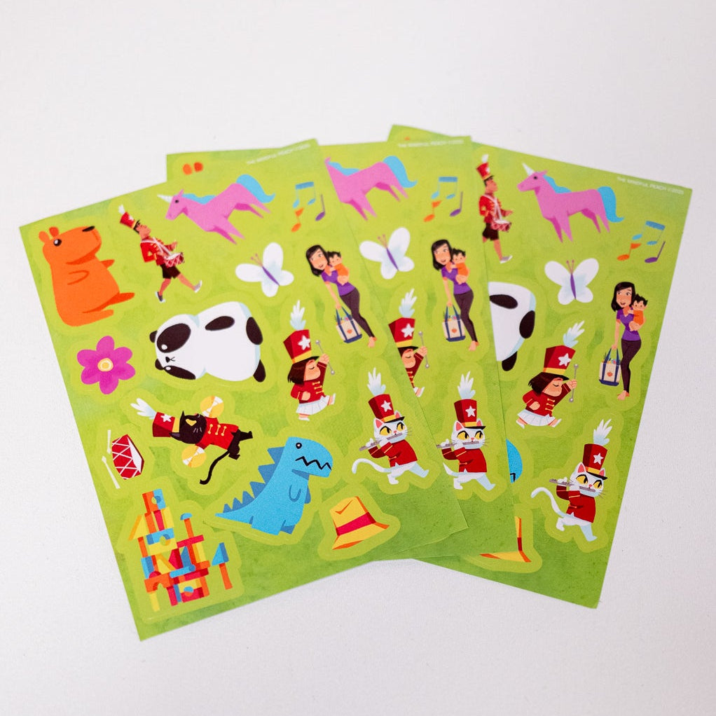 Two green sticker sheets with colorful cartoon characters on a white background