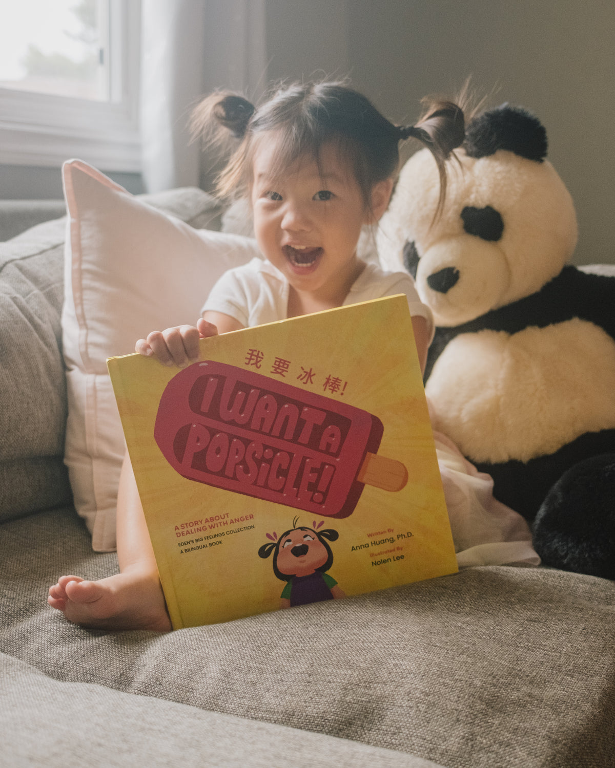 Dr. Anna Huang with her books
